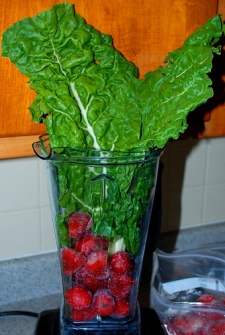 Swiss Chard and Strawberries into the blender